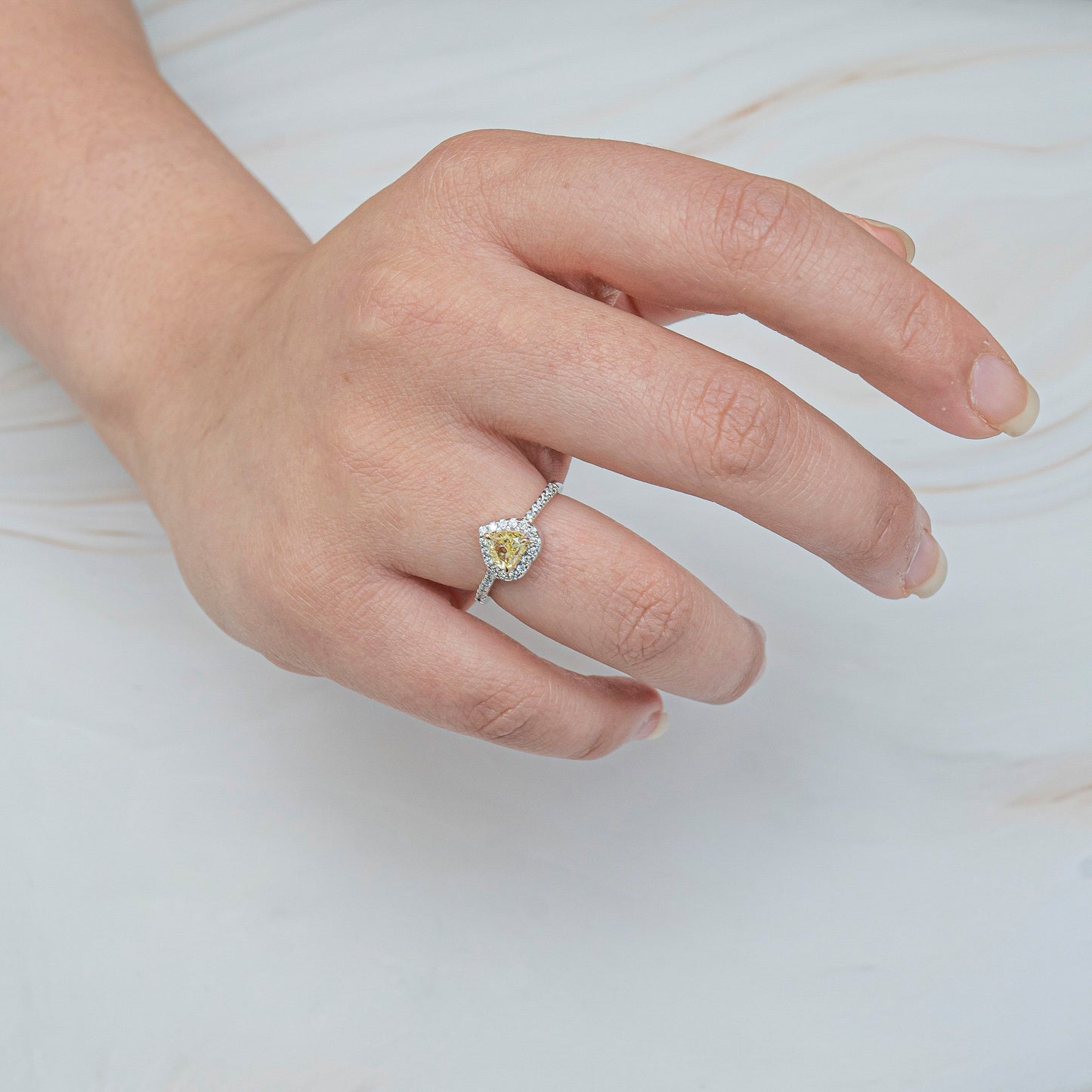 Yellow Heart Cut diamond with halo ring